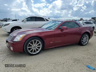 2006 Cadillac XLR z VIN 1G6YX36D165603774, wystawiony jako Copart lot #74369974 z przebiegiem Nie podano mil oraz Szkody całkowita. Historia ofert i sprzedaży dostępna na DreamBid. Obrazek 1.