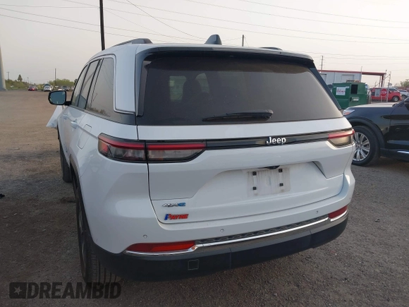 2022 Jeep Grand Cherokee with VIN 1C4RJYB63N8762798, listed as a IAAI auction lot 41723969 with 23,853 mi miles and . Bid and sale history available at DreamBid. Image 3.