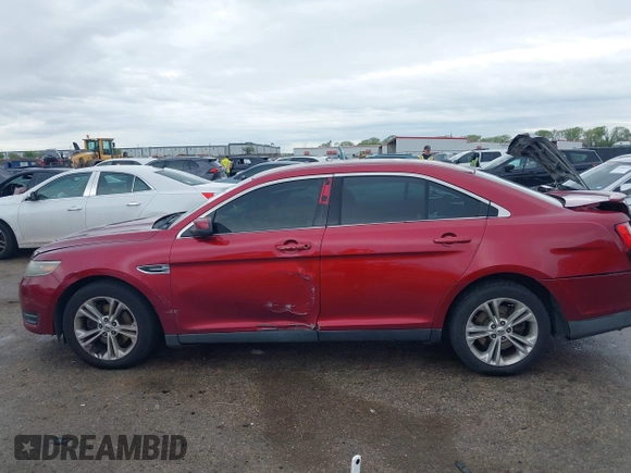 2015 Ford Taurus SEL with VIN 1FAHP2E8XFG137526, listed as a IAAI auction lot 41909658 with 147,992 mi miles and . Bid and sale history available at carsss.com. Image 14.
