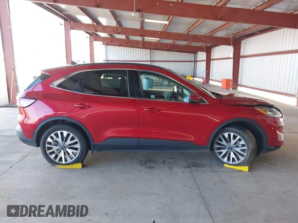 2020 Ford Escape Titanium Hybrid z VIN 1FMCU9DZ1LUC19346, wystawiony jako IAAI lot #41597142 z przebiegiem 75 945 mil mil oraz . Historia ofert i sprzedaży dostępna na DreamBid. Obrazek 13.