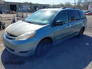 2009 Toyota Sienna CE with VIN 5TDZK23C29S275687, listed as a IAAI auction lot 42142599 with 140,729 mi miles. Bid and sale history available at carsss.com. Image 2.