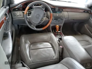 2004 Cadillac DeVille DTS z VIN 1G6KF57924U185324, wystawiony jako Copart lot #58222205 z przebiegiem 182 640 mil mil oraz Szkoda całkowita • Salvage title. Historia ofert i sprzedaży dostępna na DreamBid. Obrazek 8.