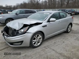2013 Kia Optima EX z VIN 5XXGN4A7XDG144632, wystawiony jako Copart lot #83599614 z przebiegiem 97 316 mil mil oraz Szkoda całkowita • Salvage title. Historia ofert i sprzedaży dostępna na DreamBid. Obrazek 1.