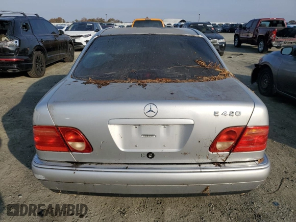 1997 Mercedes-Benz E-Class with VIN WDBJF72F6VA523987, listed as a Copart auction lot 82932444 with 216,038 mi miles and Clean Title. Bid and sale history available at carsss.com. Image 6.