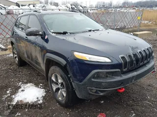 2016 Jeep Cherokee Trailhawk z VIN 1C4PJMBS9GW128892, wystawiony jako IAAI lot #42012865 z przebiegiem 121 761 mil mil oraz . Historia ofert i sprzedaży dostępna na DreamBid. Obrazek 1.