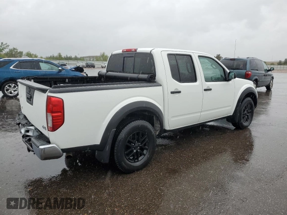 2018 Nissan Frontier SV with VIN 1N6AD0EV5JN744725, listed as a Copart auction lot 57601215 with 61,718 mi miles and Salvage title. Bid and sale history available at DreamBid. Image 3.