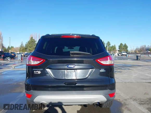 2013 Ford Escape SE with VIN 1FMCU9G98DUD88521, listed as a IAAI auction lot 41496428 with 163,321 mi miles and . Bid and sale history available at DreamBid. Image 16.