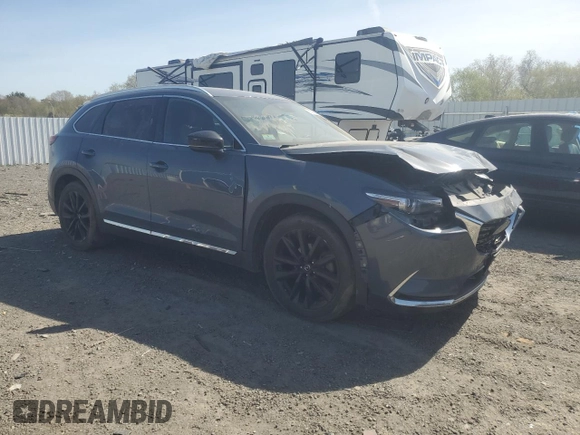 2021 Mazda CX-9 Carbon Edition with VIN JM3TCBDY7M0524887, listed as a Copart auction lot 55016555 with 61,934 mi miles and Salvage title. Bid and sale history available at DreamBid. Image 4.