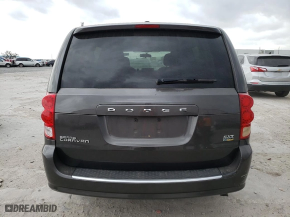 2016 Dodge Grand Caravan SXT with VIN 2C4RDGCGXGR318723, listed as a Copart auction lot 47752125 with 140,398 mi miles and Salvage Title. Bid and sale history available at carsss.com. Image 6.