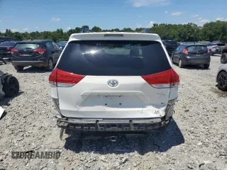 2012 Toyota Sienna LE с VIN 5TDJK3DC2CS044393, выставлен на аукционе Copart как лот 63579595 с пробегом 152 636 миль миль и Списание • Salvage title. История ставок и продаж доступна на DreamBid. Изображение 6.