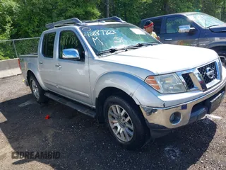 2011 Nissan Frontier Pro-4X with VIN 1N6AD0EV0BC408218, listed as a IAAI auction lot 42187823 with 165,995 mi miles and . Bid and sale history available at DreamBid. Image 1.