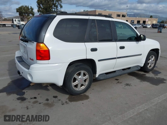 2008 GMC Envoy SLE1 with VIN 1GKDS13S482171739, listed as a IAAI auction lot 41613890 with 233,268 mi miles and . Bid and sale history available at DreamBid. Image 4.