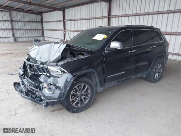2014 Jeep Grand Cherokee Limited with VIN 1C4RJFBG3EC403882, listed as a IAAI auction lot 41394712 with 168,892 mi miles. Bid and sale history available at carsss.com. Image 2.