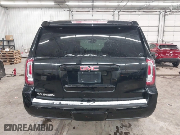 2016 GMC Yukon SLT with VIN 1GKS2BKC9GR176948, listed as a IAAI auction lot 41361221 with 125,178 mi miles. Bid and sale history available at carsss.com. Image 17.