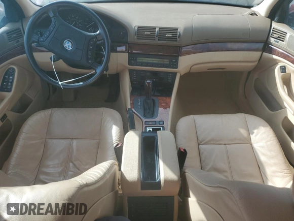 1997 BMW 5 Series 540i z VIN WBADE6320VBW54072, wystawiony jako Copart lot #74403104 z przebiegiem 98 910 mil mil oraz Czysty tytuł • Clean title. Historia ofert i sprzedaży dostępna na DreamBid. Obrazek 8.