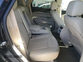 2013 Cadillac SRX Premium Collection z VIN 3GYFNEE37DS622065, wystawiony jako Copart lot #57468065 z przebiegiem 108 796 mil mil oraz Szkoda całkowita • Salvage title. Historia ofert i sprzedaży dostępna na DreamBid. Obrazek 10.