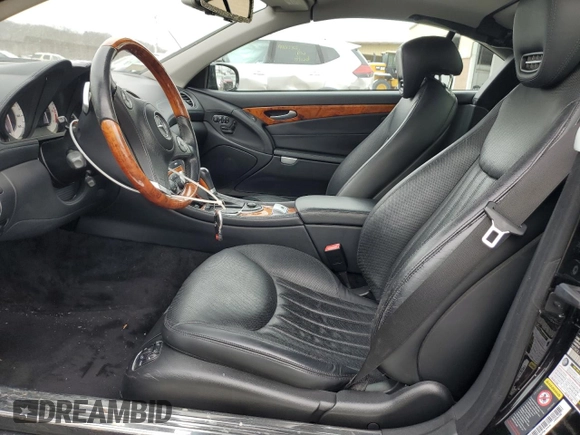 2009 Mercedes-Benz SL 550 with VIN WDBSK71F29F152210, listed as a Copart auction lot 44854165 with 69,777 mi miles and Salvage title. Bid and sale history available at DreamBid. Image 7.