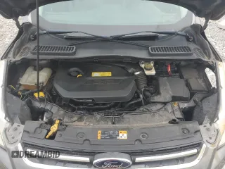 2013 Ford Escape SEL z VIN 1FMCU9HX7DUC11052, wystawiony jako Copart lot #62377515 z przebiegiem 225 704 mil mil oraz Szkoda całkowita • Salvage title. Historia ofert i sprzedaży dostępna na DreamBid. Obrazek 12.