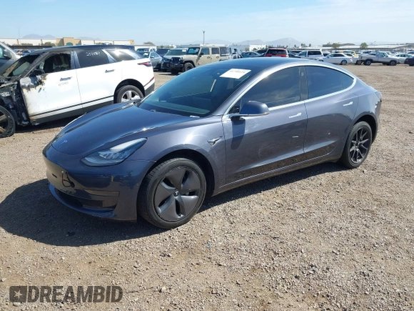 2020 Tesla Model 3 Standard Range Plus with VIN 5YJ3E1EA5LF644282, listed as a IAAI auction lot 41710124 with 69,969 mi miles and . Bid and sale history available at DreamBid. Image 18.