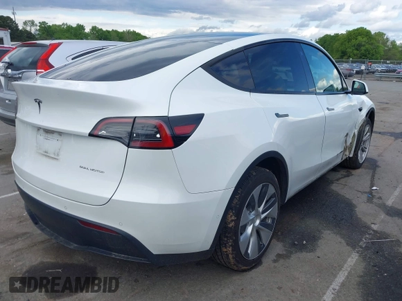 2022 Tesla Model Y Long Range z VIN 7SAYGDEE6NF419332, wystawiony jako IAAI lot #42020974 z przebiegiem 55 680 mil mil oraz . Historia ofert i sprzedaży dostępna na DreamBid. Obrazek 4.