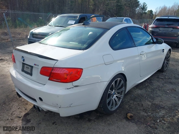 2013 BMW M3 with VIN WBSKG9C57DJ593607, listed as a IAAI auction lot 41586910 with 102,940 mi miles. Bid and sale history available at carsss.com. Image 4.