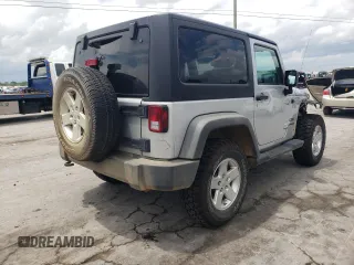 2012 Jeep Wrangler Sport z VIN 1C4AJWAG4CL185009, wystawiony jako Copart lot #61203395 z przebiegiem 93 534 mil mil oraz Szkoda całkowita • Salvage title. Historia ofert i sprzedaży dostępna na DreamBid. Obrazek 3.