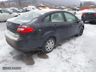 2013 Ford Fiesta S with VIN 3FADP4AJ5DM108912, listed as a IAAI auction lot 41303804 with 100,865 mi miles. Bid and sale history available at carsss.com. Image 4.