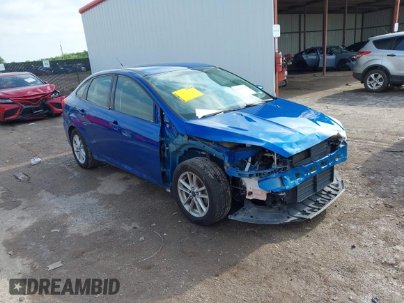 2018 Ford Focus SE z VIN 1FADP3F2XJL293337, wystawiony jako IAAI lot #42121294 z przebiegiem 71 241 mil mil oraz . Historia ofert i sprzedaży dostępna na DreamBid. Obrazek 1.