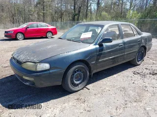 1995 Toyota Camry LE with VIN 4T1GK12E5SU860216, listed as a IAAI auction lot 41803933 with 235,130 mi miles. Bid and sale history available at carsss.com. Image 2.