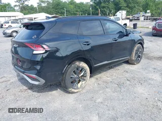 2023 Kia Sportage SX-Prestige with VIN KNDPXCAG1P7020251, listed as a IAAI auction lot 42364221 with 129,885 mi miles and . Bid and sale history available at DreamBid. Image 4.