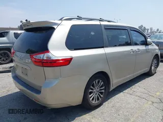 2015 Toyota Sienna XLE with VIN 5TDYK3DC4FS560743, listed as a IAAI auction lot 42488745 with 145,009 mi miles and . Bid and sale history available at DreamBid. Image 4.