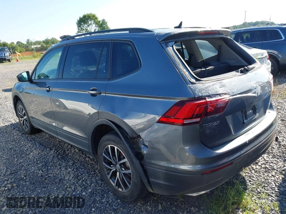2021 Volkswagen Tiguan S with VIN 3VV1B7AX7MM038431, listed as a IAAI auction lot 42726529 with 82,289 mi miles and . Bid and sale history available at DreamBid. Image 3.