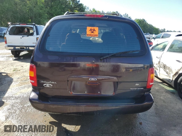 1998 Ford Windstar GL with VIN 2FMDA5145WBB91480, listed as a Copart auction lot 52155155 with 101,104 mi miles and Salvage title. Bid and sale history available at DreamBid. Image 6.