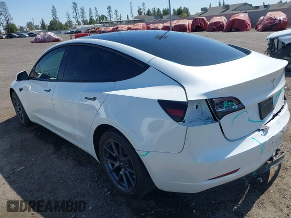 2023 Tesla Model 3 z VIN 5YJ3E1EA5PF517893, wystawiony jako IAAI lot #42515181 z przebiegiem 38 538 mil mil oraz . Historia ofert i sprzedaży dostępna na DreamBid. Obrazek 3.