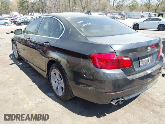 2012 BMW 5 Series 528i with VIN WBAXG5C58CDY28516, listed as a IAAI auction lot 41907803 with 116,499 mi miles. Bid and sale history available at carsss.com. Image 3.
