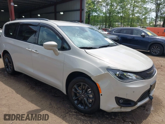 2020 Chrysler Pacifica Launch Edition z VIN 2C4RC3BG6LR288952, wystawiony jako IAAI lot #42122770 z przebiegiem 32 942 mil mil oraz . Historia ofert i sprzedaży dostępna na DreamBid. Obrazek 1.