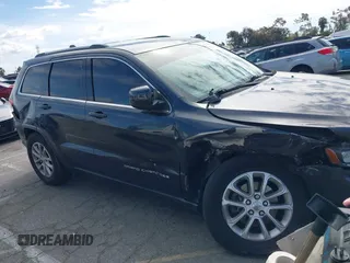 2015 Jeep Grand Cherokee Altitude with VIN 1C4RJEAG8FC669119, listed as a IAAI auction lot 41724699 with 159,902 mi miles. Bid and sale history available at carsss.com. Image 13.