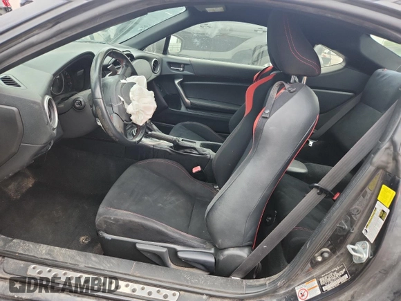 2015 Scion FR-S z VIN JF1ZNAA12F8711821, wystawiony jako Copart lot #59886505 z przebiegiem 115 796 mil mil oraz Szkoda całkowita • Salvage title. Historia ofert i sprzedaży dostępna na DreamBid. Obrazek 7.
