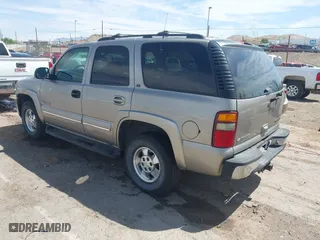 2000 Chevrolet New Tahoe LT with VIN 1GNEK13T7YJ185916, listed as a IAAI auction lot 42109831 with 205,165 mi miles. Bid and sale history available at carsss.com. Image 3.
