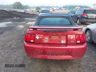 2004 Ford Mustang Deluxe with VIN 1FAFP44604F212319, listed as a IAAI auction lot 42100591 with 191,992 mi miles. Bid and sale history available at carsss.com. Image 14.