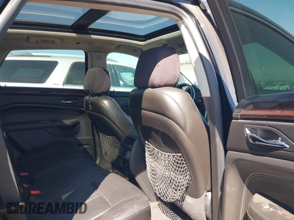 2012 Cadillac SRX Performance Collection with VIN 3GYFNBE38CS544151, listed as a IAAI auction lot 41870570 with 208,153 mi miles and . Bid and sale history available at DreamBid. Image 8.