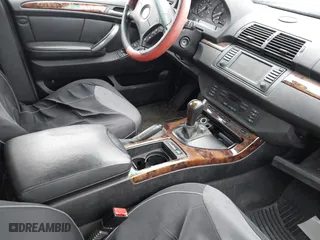 2005 BMW X5 3.0i with VIN 5UXFA13575LY08841, listed as a IAAI auction lot 41831889 with 999,999 mi miles. Bid and sale history available at carsss.com. Image 5.
