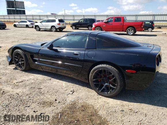 2002 Chevrolet Corvette with VIN 1G1YY22G425127253, listed as a Copart auction lot 74689014 with 68,080 mi miles and Salvage Title. Bid and sale history available at carsss.com. Image 2.