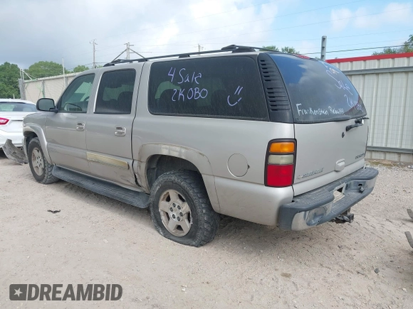 2004 Chevrolet Suburban LT with VIN 1GNEC16Z34J268718, listed as a IAAI auction lot 42078372 with 433,488 mi miles and . Bid and sale history available at DreamBid. Image 3.