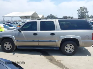 2002 Chevrolet Suburban LT z VIN 1GNFK16T92J208121, wystawiony jako IAAI lot #42163490 z przebiegiem 177 145 mil mil oraz . Historia ofert i sprzedaży dostępna na DreamBid. Obrazek 14.