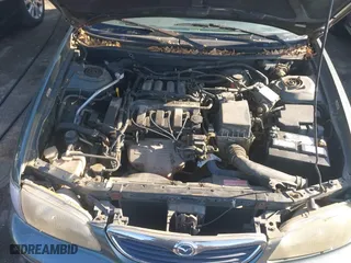 1998 Mazda 626 DX with VIN 1YVGF22C4W5768778, listed as a IAAI auction lot 41971066 with 119,168 mi miles. Bid and sale history available at carsss.com. Image 10.