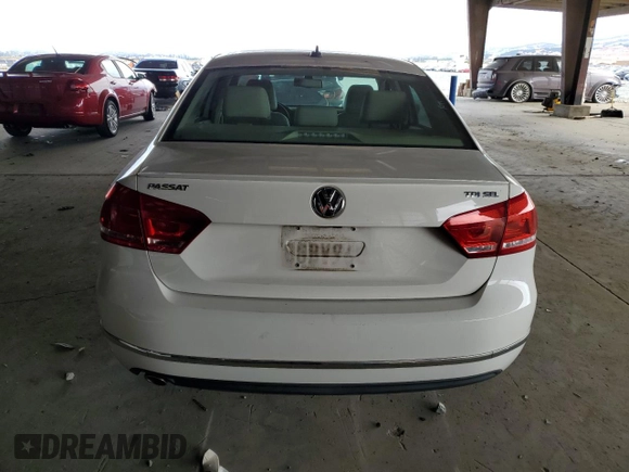 2015 Volkswagen Passat SEL Premium with VIN 1VWCV7A38FC073671, listed as a Copart auction lot 66022775 with 64,452 mi miles and Salvage title. Bid and sale history available at DreamBid. Image 6.