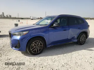2023 BMW X1 xDrive28i with VIN WBX73EF03P5W15779, listed as a Copart auction lot 46823575 with 60,375 mi miles and Salvage Title. Bid and sale history available at carsss.com. Image 1.