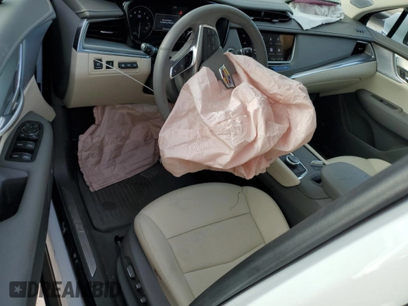 2024 Cadillac XT5 FWD Premium Luxury with VIN 1GYKNCRSXRZ745180, listed as a Copart auction lot 87627615 with 6,753 mi miles and Salvage Title. Bid and sale history available at carsss.com. Image 8.