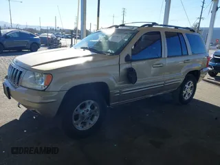 1999 Jeep Grand Cherokee Limited with VIN 1J4GW68NXXC727844, listed as a IAAI auction lot 41290773 with 222,838 mi miles. Bid and sale history available at carsss.com. Image 18.